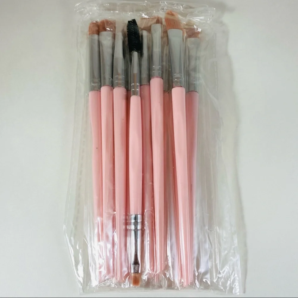 Full set of synthetic eye shadow brushes with blush pink handles